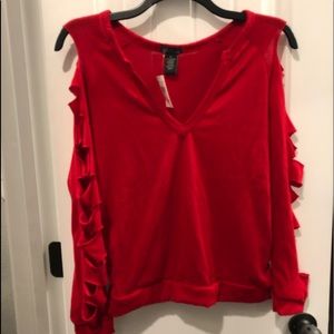 Light sweater with slits on sleeves